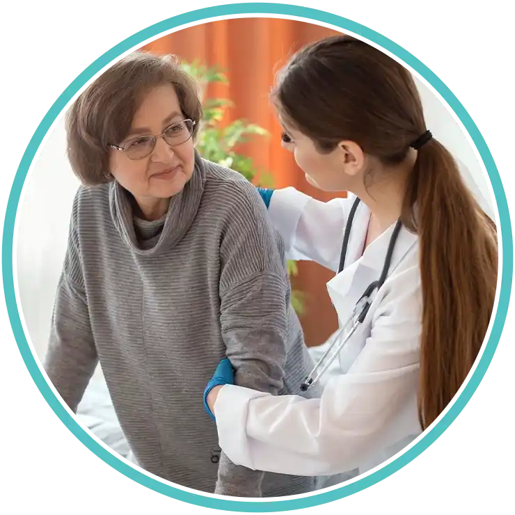Doctor shaking hands with a female patient in a clinic
