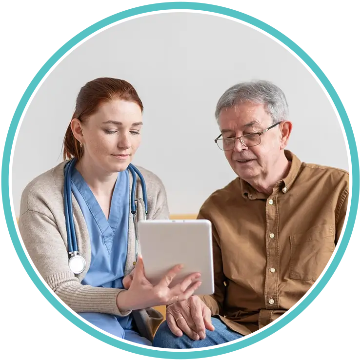 Doctor assisting an elderly man during a medical visit