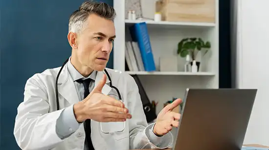 Doctor explaining treatment options to a patient during an online consultation for residents of Trenton and Pennington