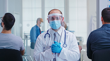Doctor in medical kit representing preventive care for patients in Robbinsville, New Jersey.