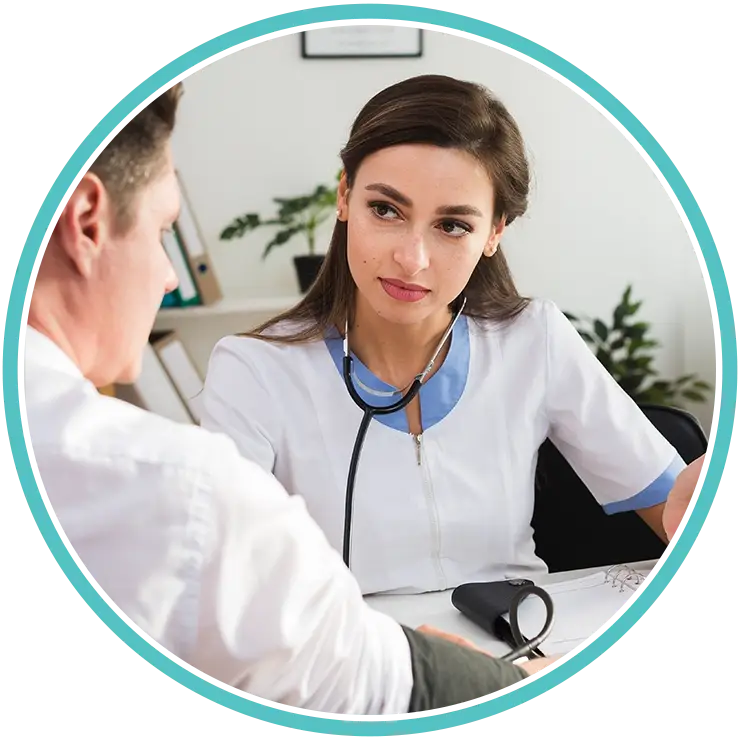 Female doctor attentively listening to a patient during consultation