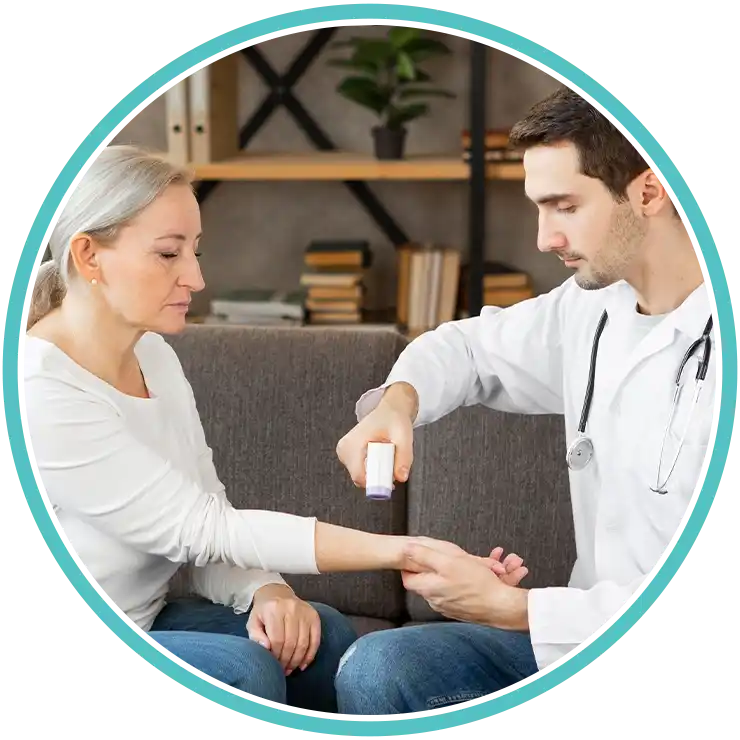 Doctor reviewing health records during preventive care visit