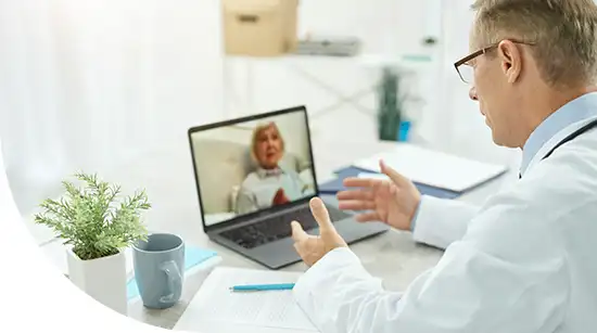 Doctor talking with a patient during a virtual appointment